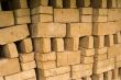 Stack of raw bricks drying in the open air