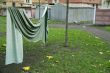 Curtain drying on string in backyard 