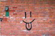 Brick Wall and Smile Graffiti 