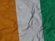 Close up of Ruffled Cote d Ivoire flag